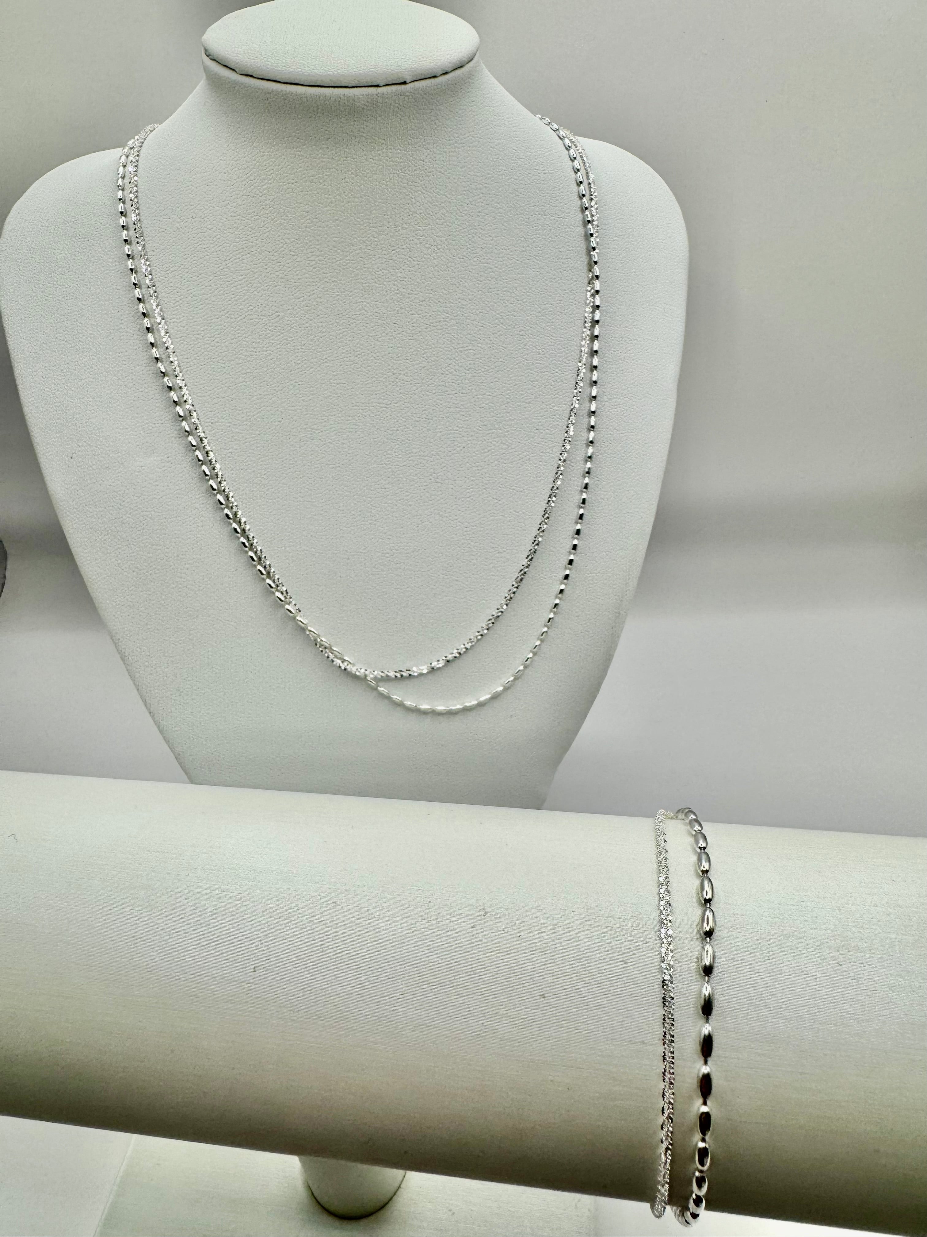 Double silver set sparkles without any gemstone