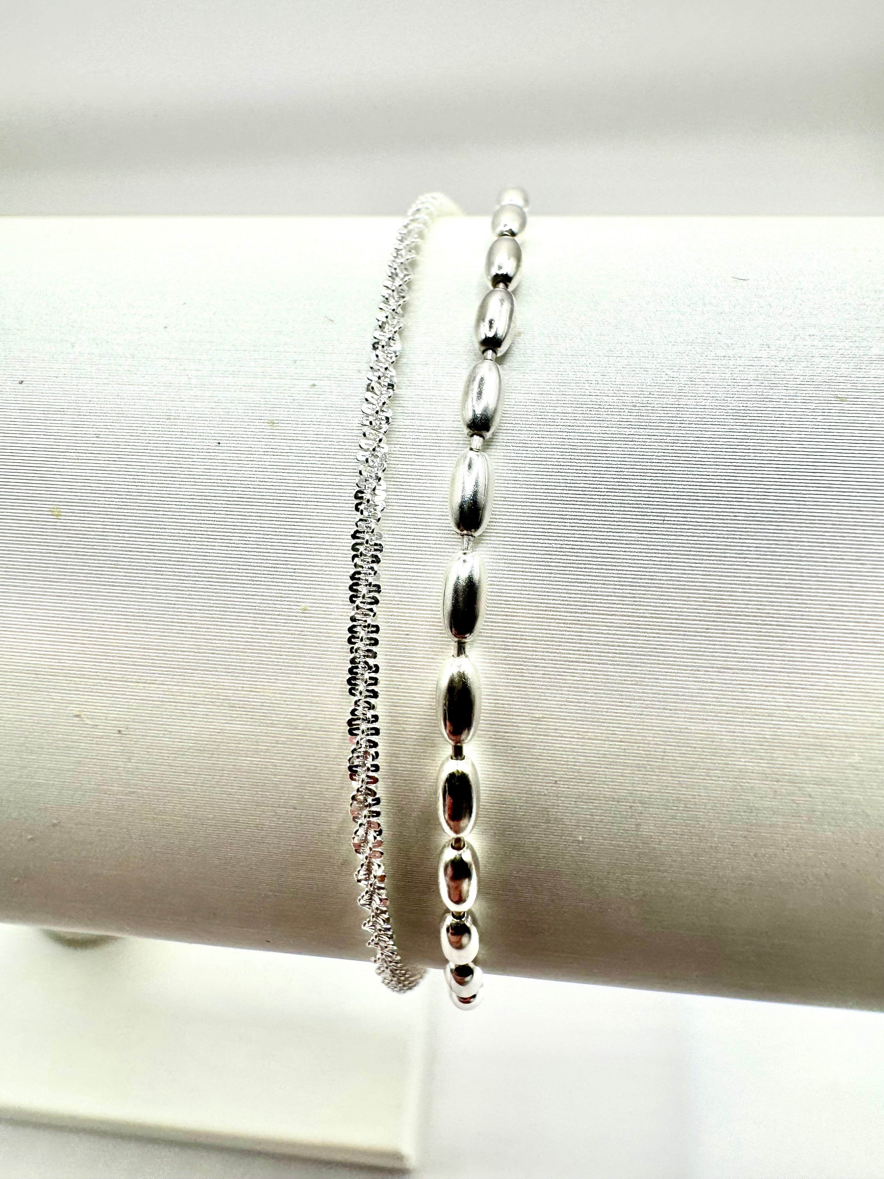 Double silver set sparkles without any gemstone